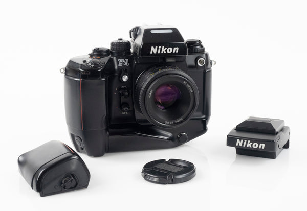 Nikon F4 with MB-20 grip, MB-21 grip, 50/1.8 lens, and waist level finder -  $390