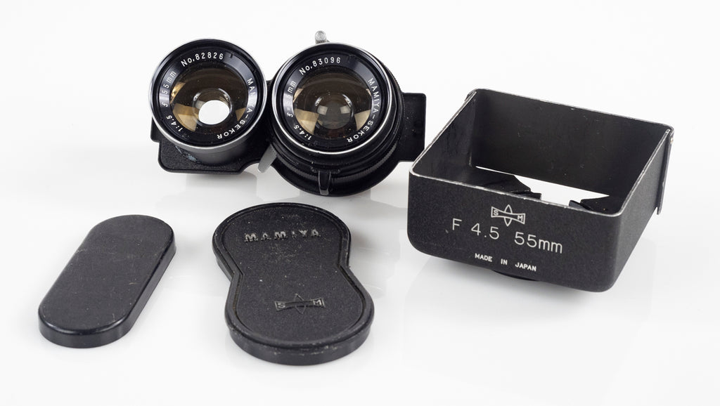 Mamiya-Sekor 55mm/f4.5 lens with front and back lens caps and lens hood